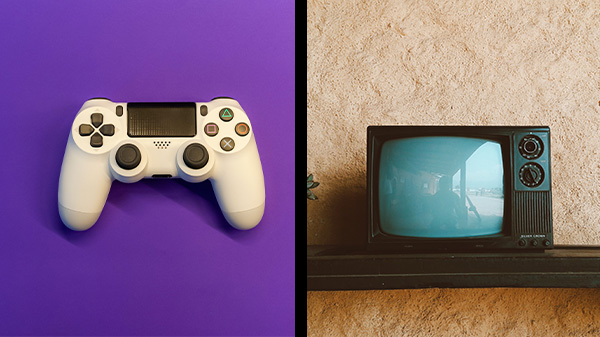 Image of PS4 controller beside old TV